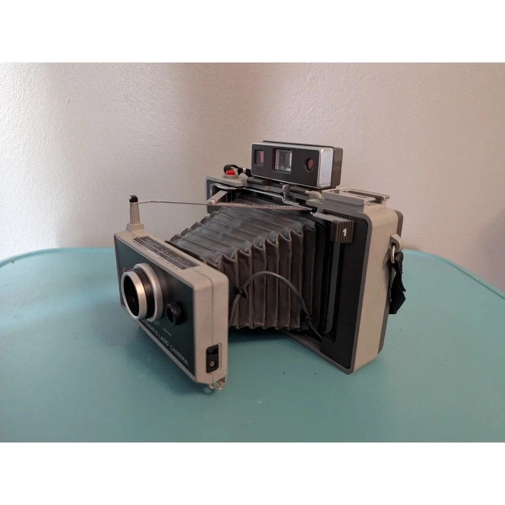 Vintage Polaroid 440 Automatic Land Camera with Strap, Case, Film, and Xtra Bulb
